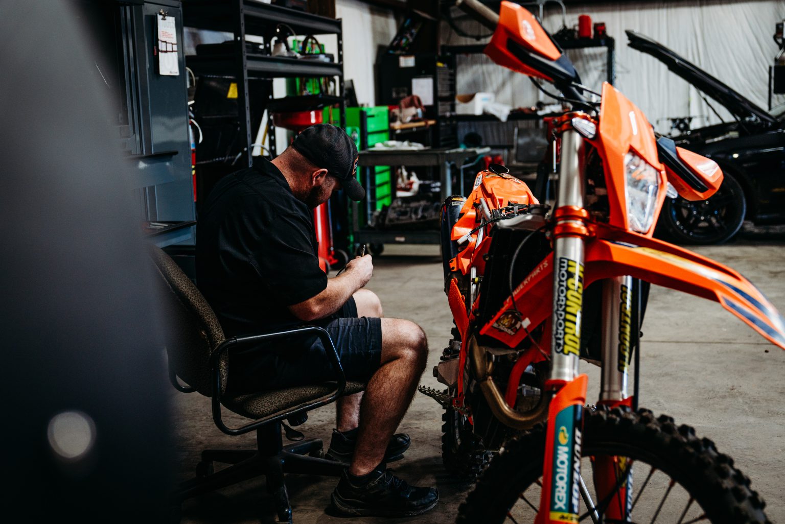 A member of the S Squared team working in the shop